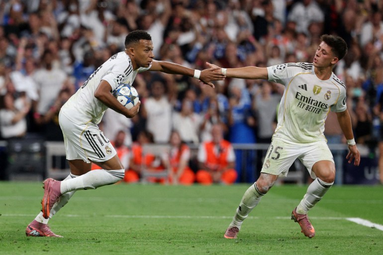 Mbappe rescues 10-man Real Madrid against Marseille in Champions League | Football News | Al Jazeera