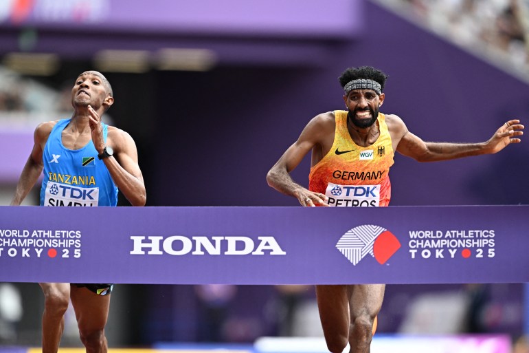 Simbu from Tanzania wins marathon gold in historic photo finish | Athletics News | Al Jazeera