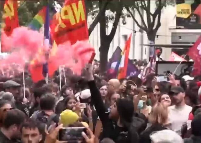 Police clash with thousands protesting Macron across France